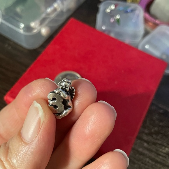 925 Silver cherub holding the #3 Chamilia Bead - Picture 1 of 10